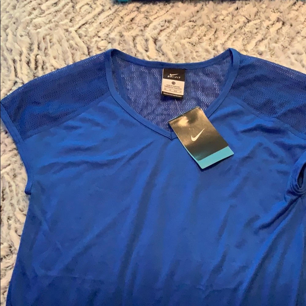Blue Nike Dri-fit shirt